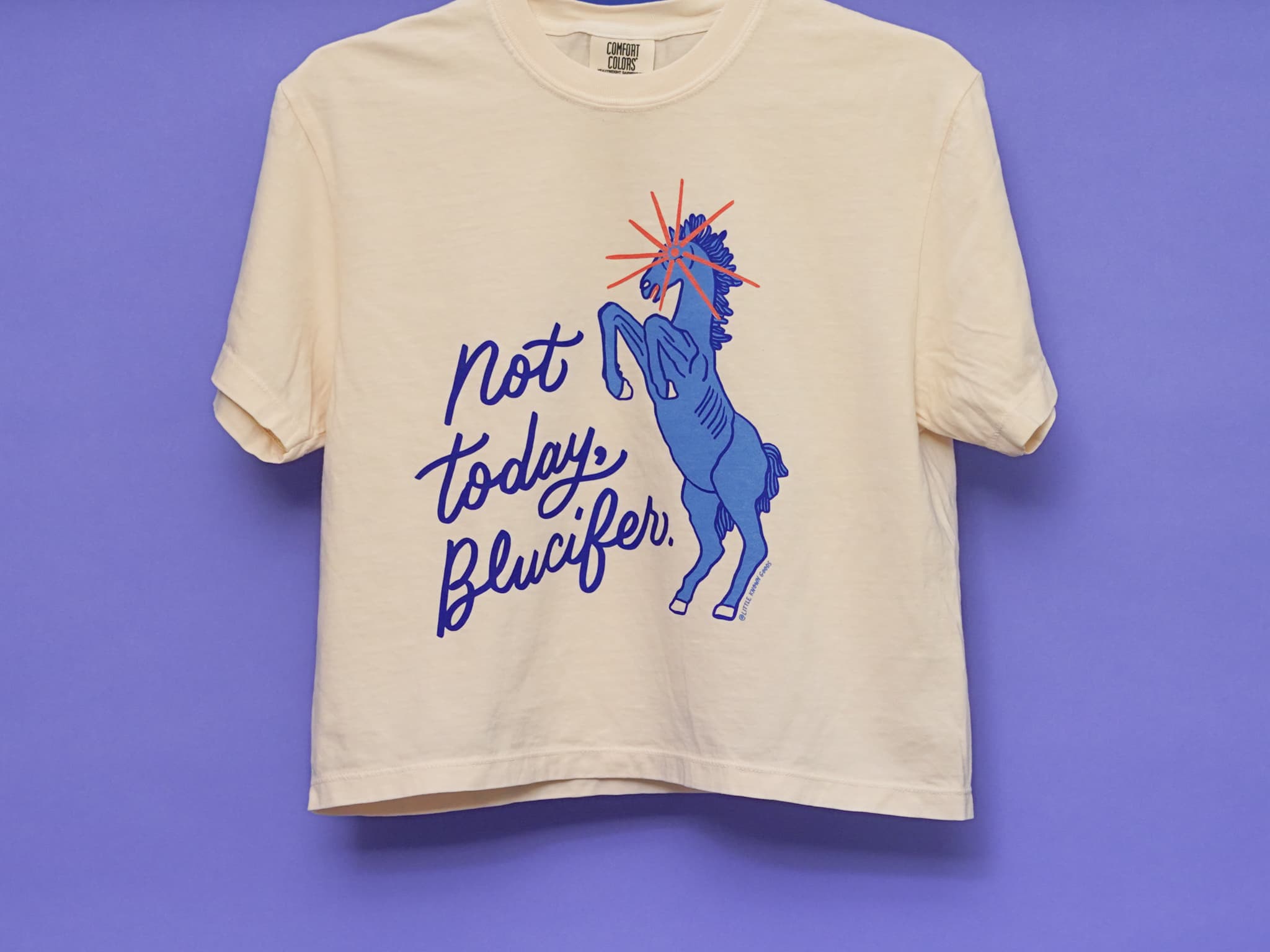 not today, blucifer crop tee. blucifer’s glowing red eye peers directly into your soul